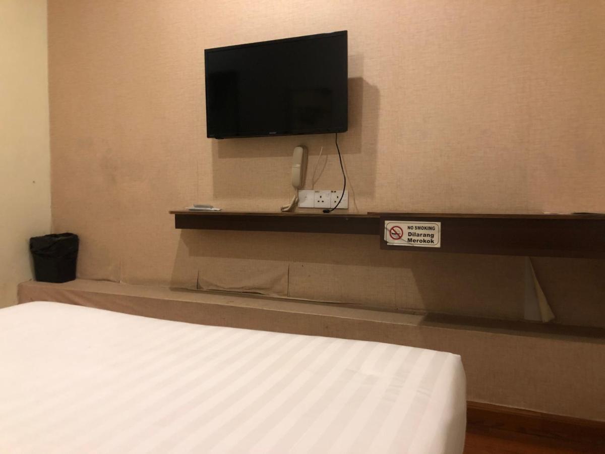 Super Oyo 90668 Joy Inn Miri Bagian luar foto