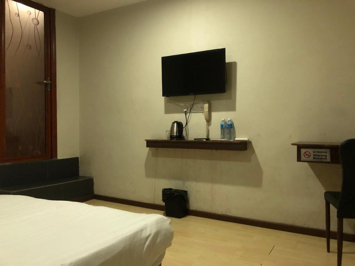 Super Oyo 90668 Joy Inn Miri Bagian luar foto