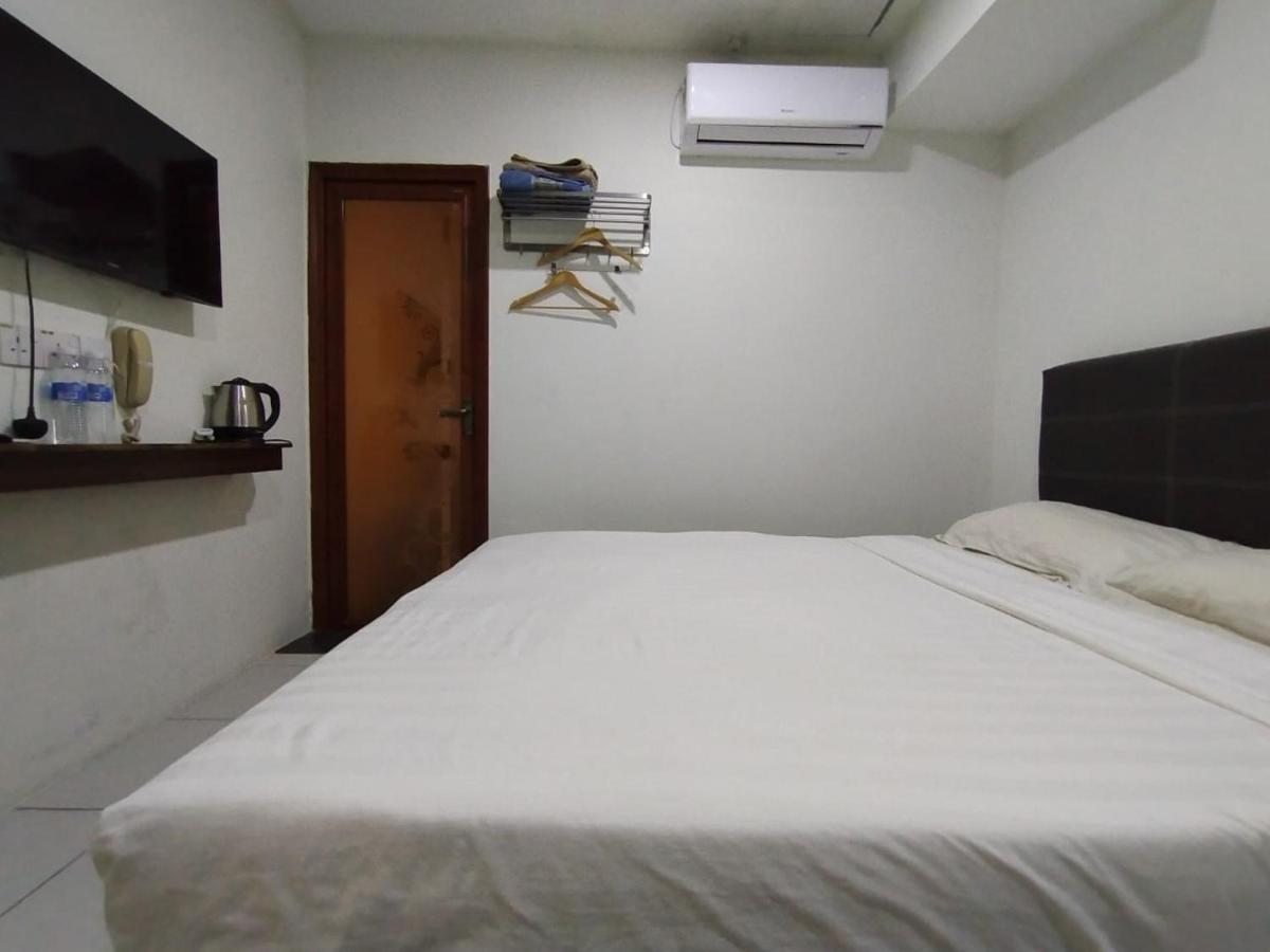 Super Oyo 90668 Joy Inn Miri Bagian luar foto