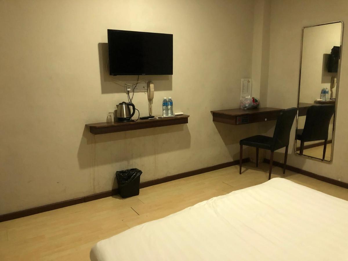 Super Oyo 90668 Joy Inn Miri Bagian luar foto